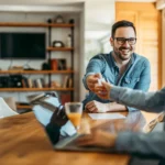 Couple shopping online at home.